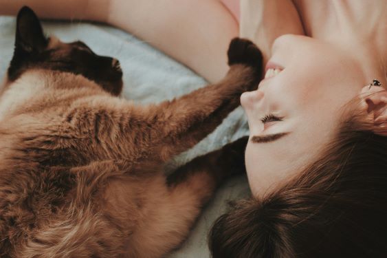 person with cat