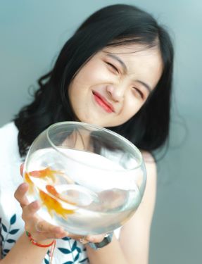 person with fishbowl